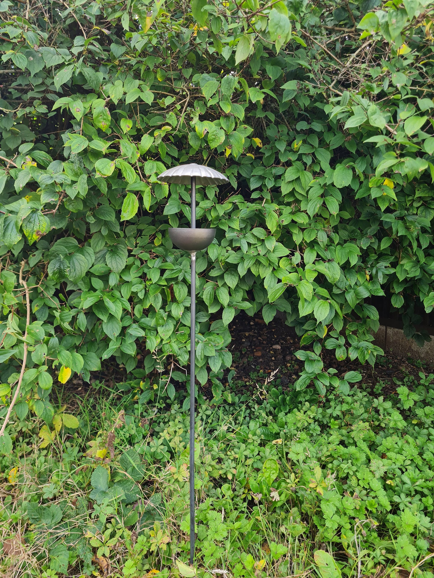 Rustic metal umbrella style bird feeder stake