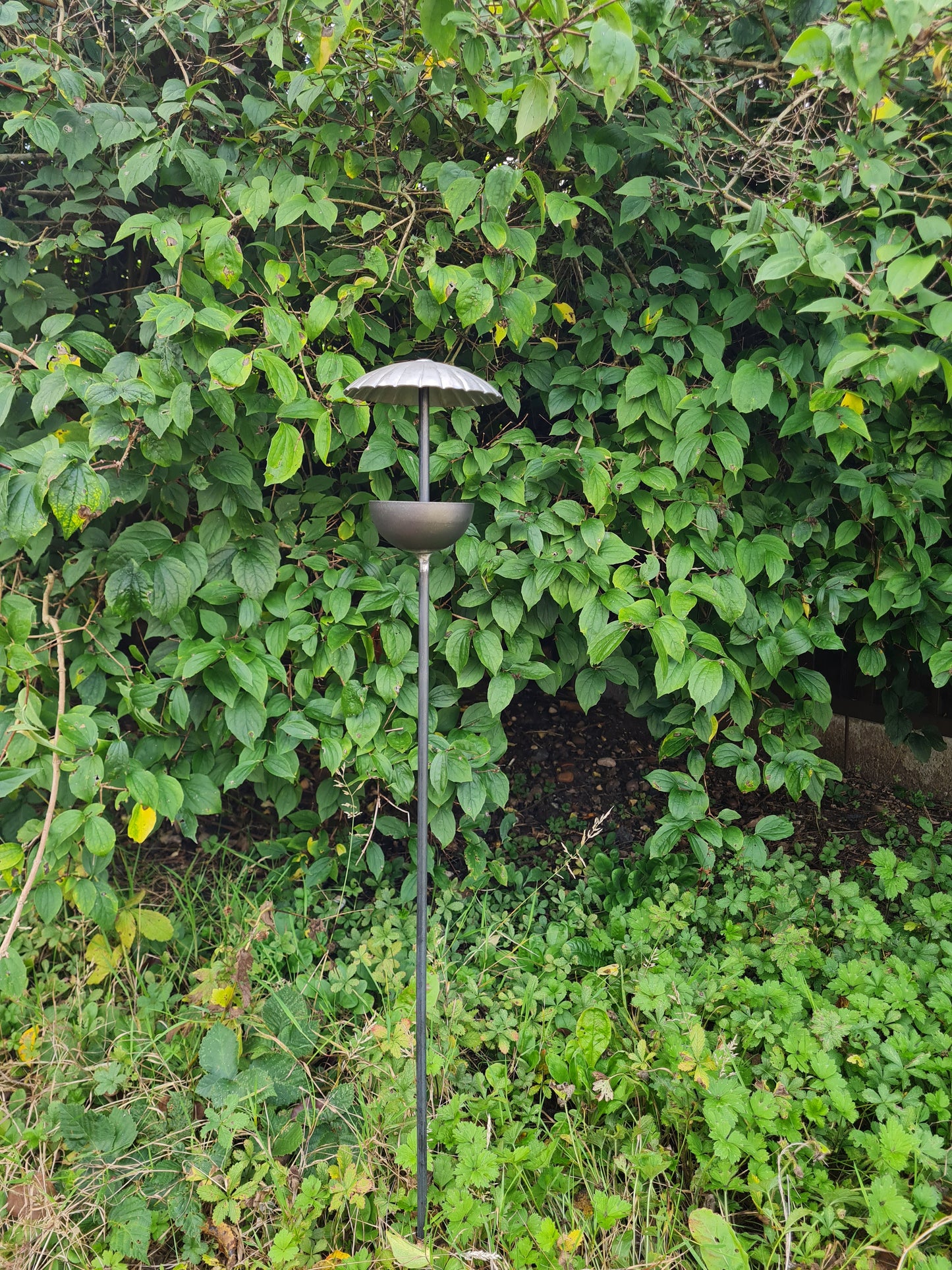 Rustic metal umbrella style bird feeder stake