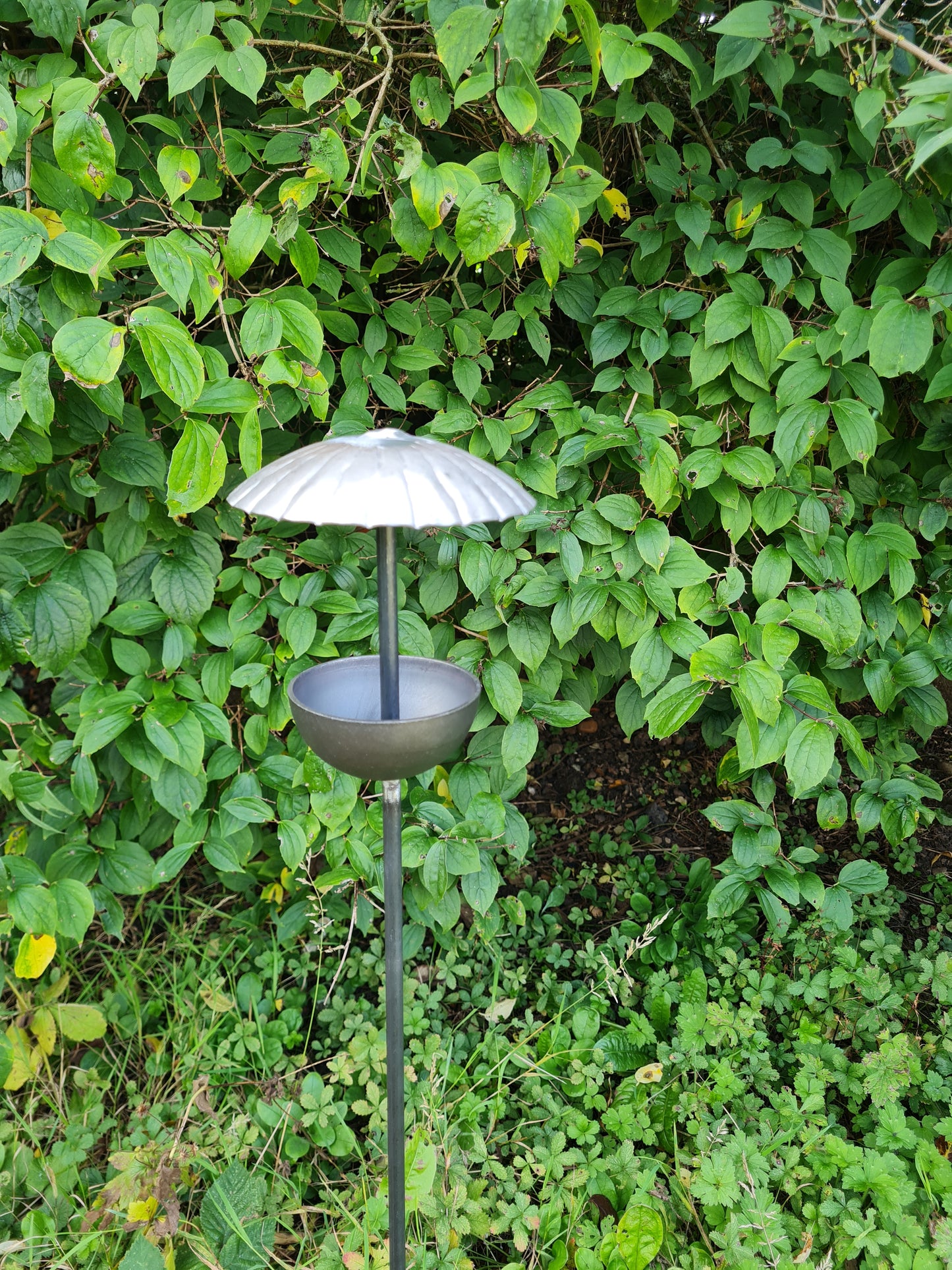 Rustic metal umbrella style bird feeder stake