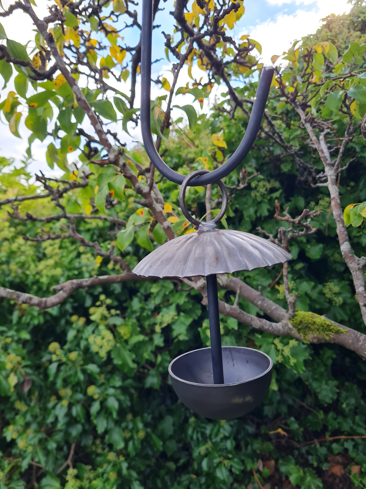 Rustic metal umbrella style hanging bird feeder